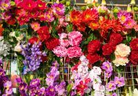 a wall of artificial flowers